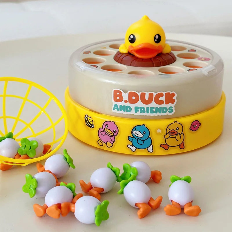 Children's fishing game with a yellow duck on top, surrounded by plastic ducks and carrots on a light background.